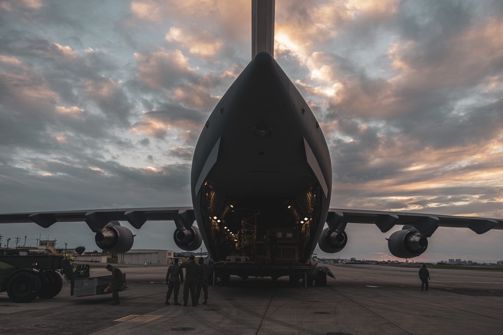 U.S. Air Force C-17 lands on MCAS Futenma to deliver two AH-1Z Viper attack helicopters