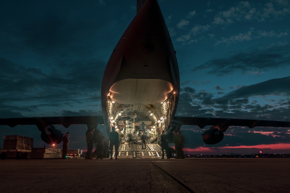 U.S. Air Force C-17 lands on MCAS Futenma to deliver two AH-1Z Viper attack helicopters