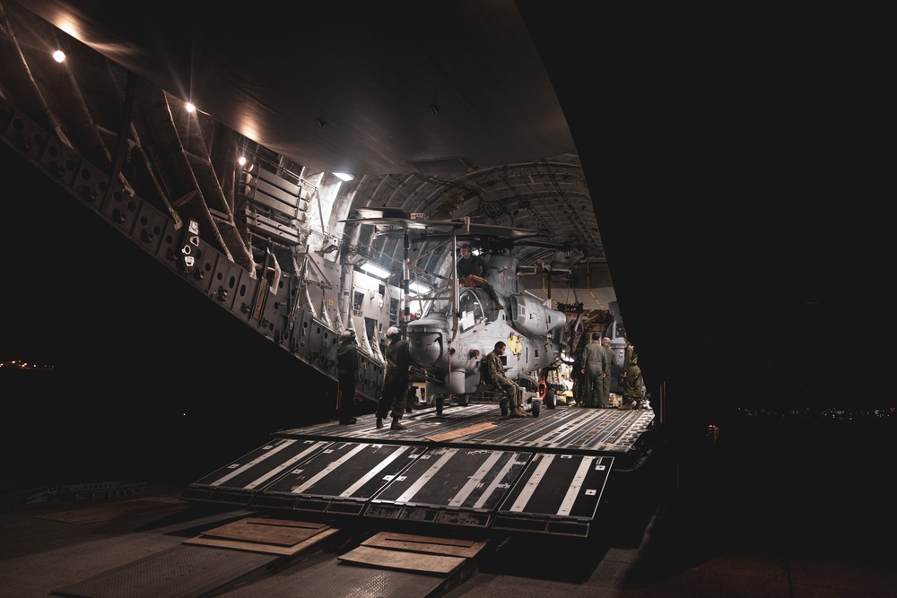 U.S. Air Force C-17 lands on MCAS Futenma to deliver two AH-1Z Viper attack helicopters