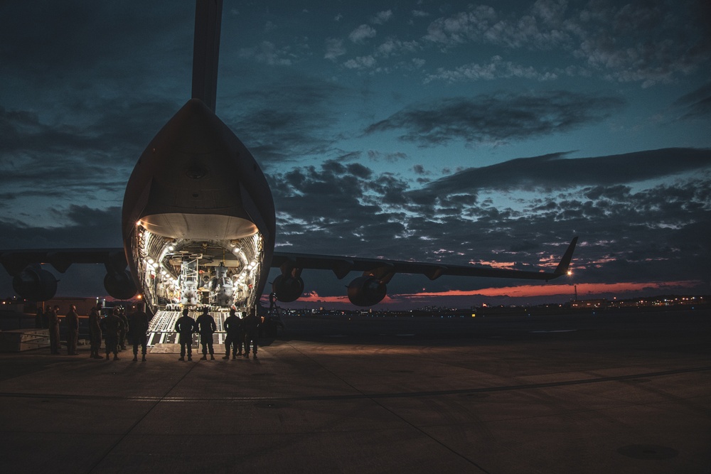 U.S. Air Force C-17 lands on MCAS Futenma to deliver two AH-1Z Viper attack helicopters