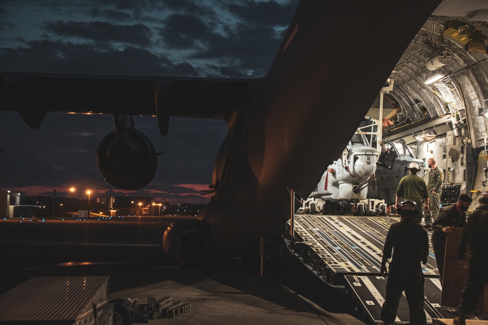 U.S. Air Force C-17 lands on MCAS Futenma to deliver two AH-1Z Viper attack helicopters