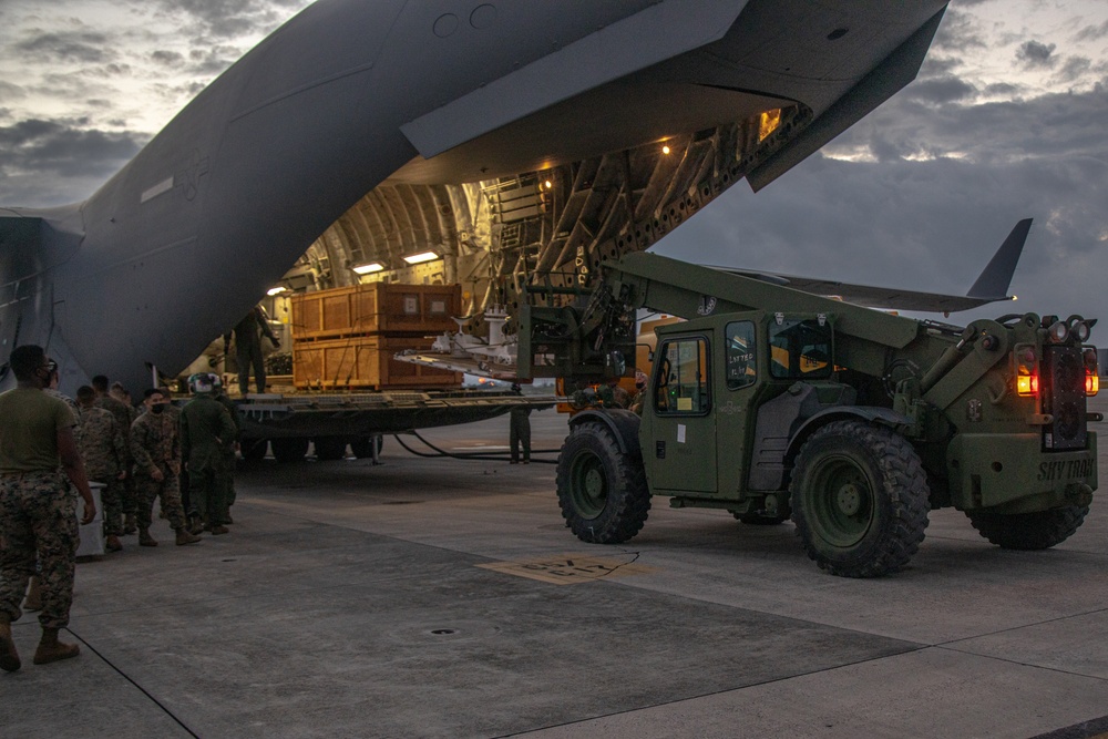 U.S. Air Force C-17 lands on MCAS Futenma to deliver two AH-1Z Viper attack helicopters