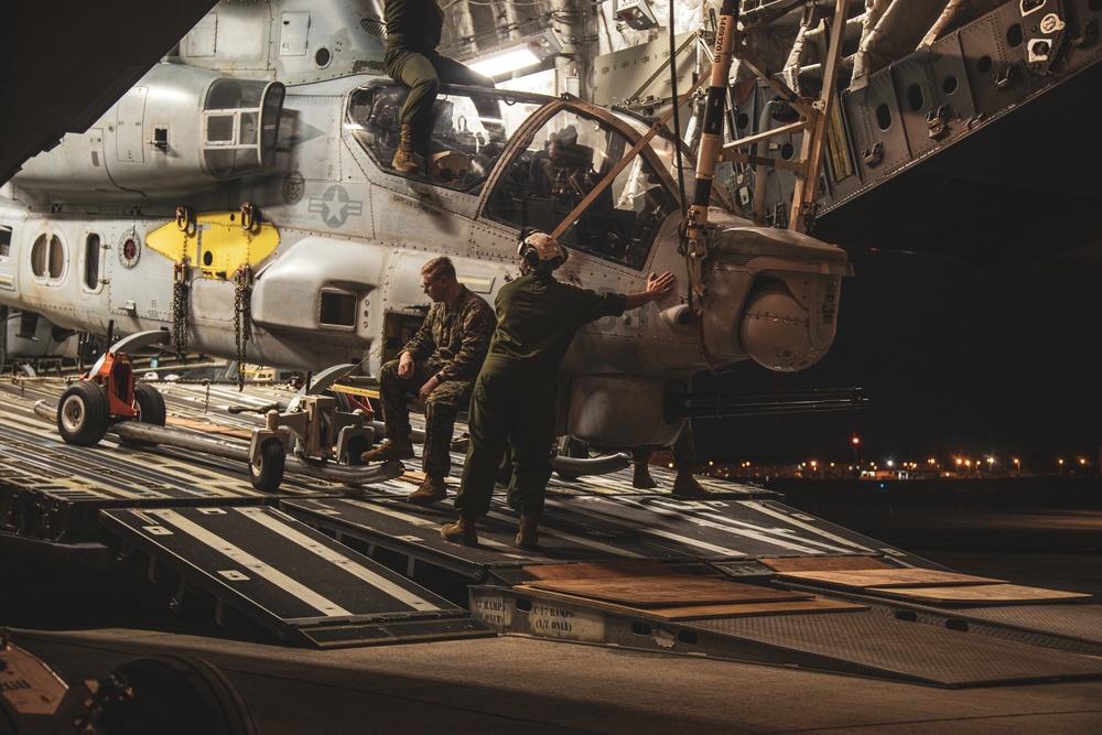 U.S. Air Force C-17 lands on MCAS Futenma to deliver two AH-1Z Viper attack helicopters