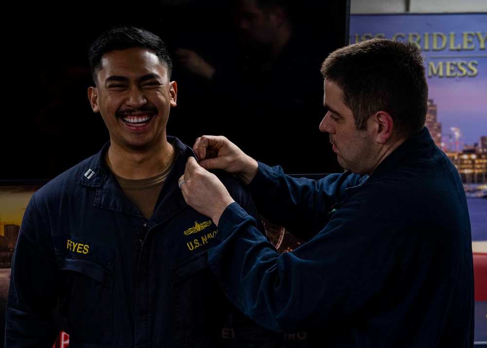 Gridley conducts a pinning ceremony