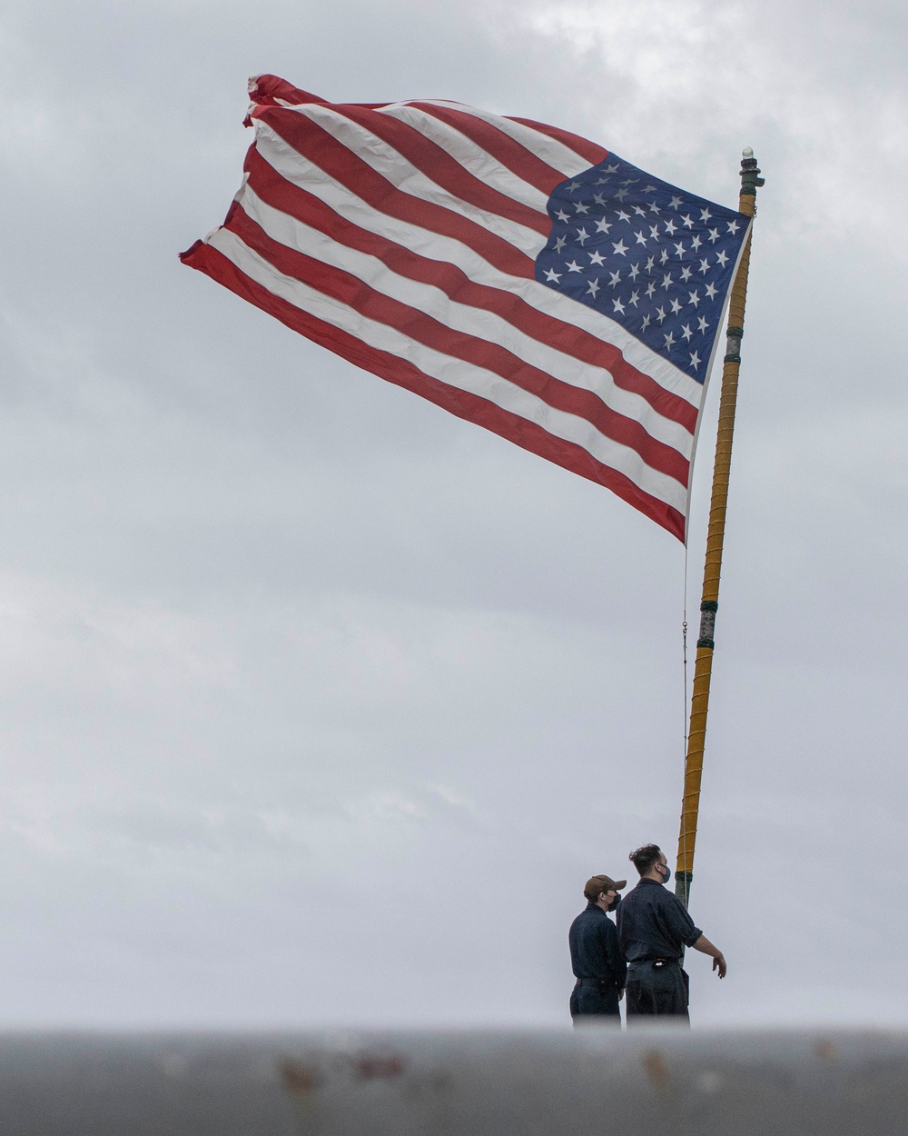 USS Greenbay departs White Beach