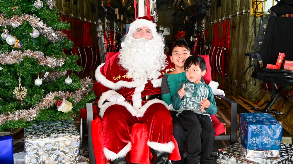 C-130 Delivers Santa to Team Pope