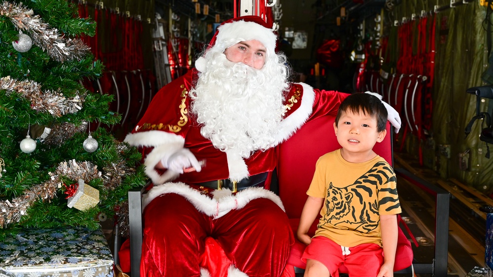 C-130 Delivers Santa to Team Pope