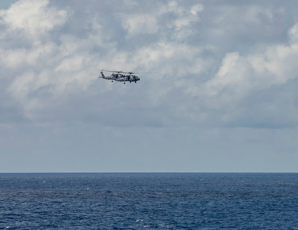 Squadrons Aboard USS Ralph Johnson (DDG 114) and HMAS Arunta (FFH 151) of the Royal Australian Navy Conduct Joint Flight Operations