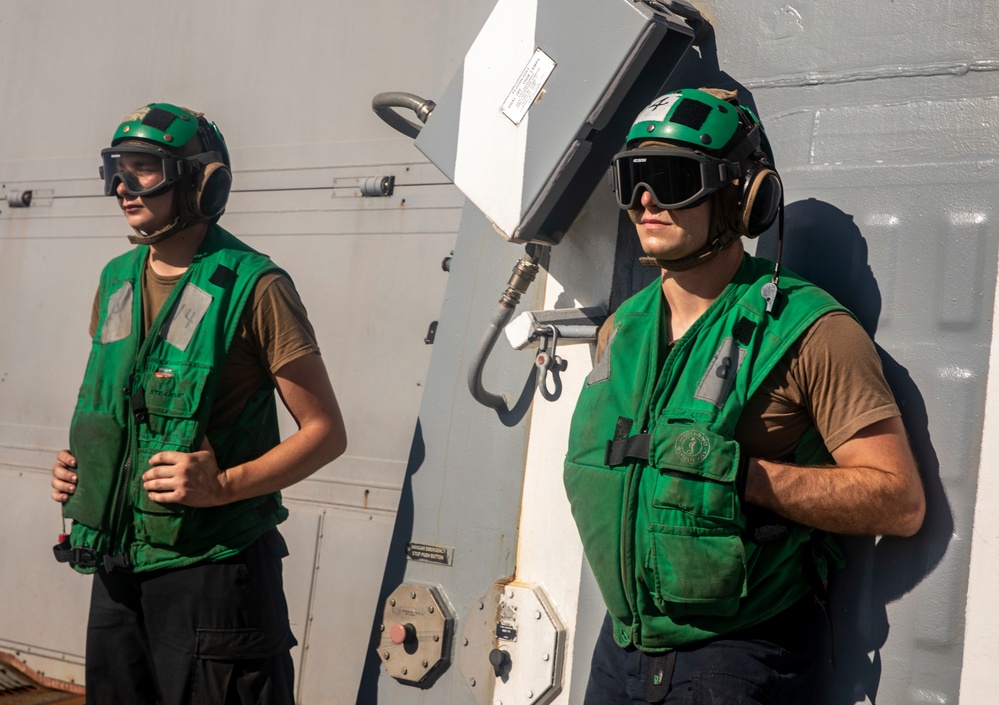 Sailors Aboard USS Ralph Johnson (DDG 114) Conduct Flight Operations