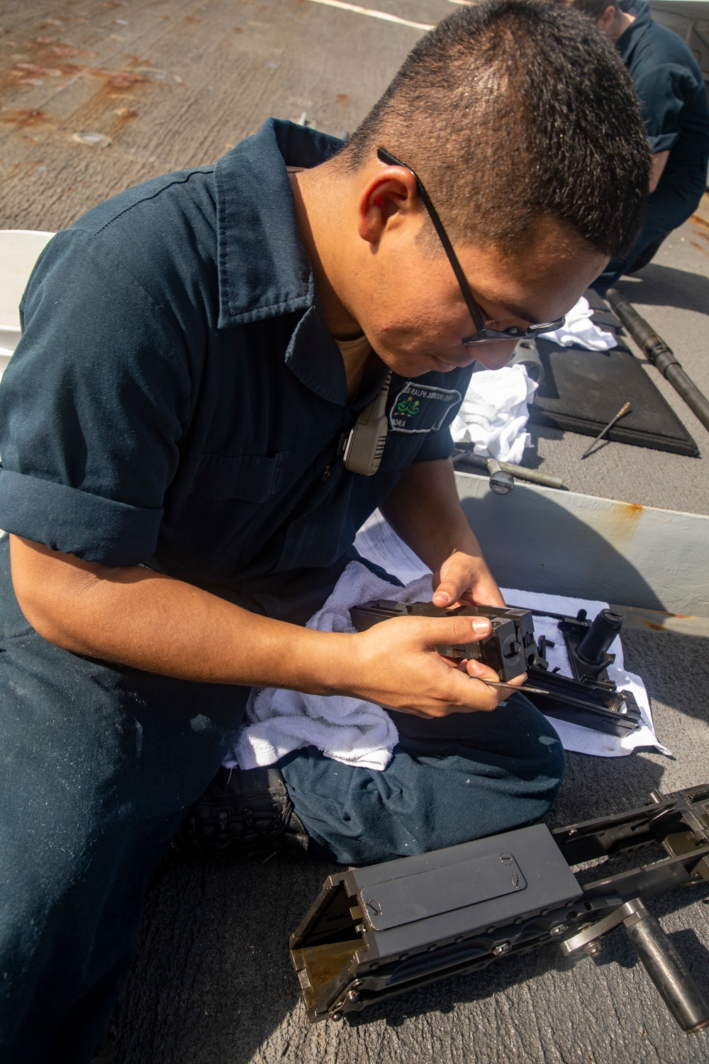 Sailors Conduct Daily Maintenance Aboard USS Ralph Johnson (DDG 114)