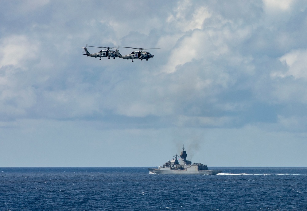 Squadrons Aboard USS Ralph Johnson (DDG 114) and HMAS Arunta (FFH 151) of the Royal Australian Navy Conduct Joint Flight Operations