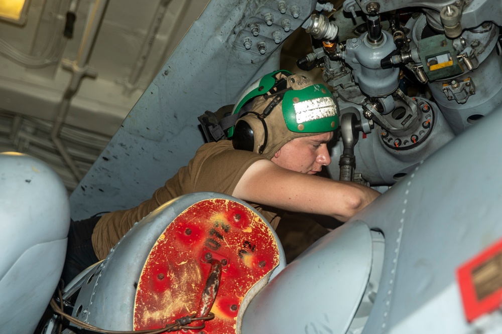 Sailors Conduct Maintenance on Aircraft Aboard USS Ralph Johnson (DDG 114)