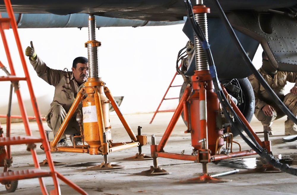 Iraq Air Force Conduct Maintenance on SU-25 Jets