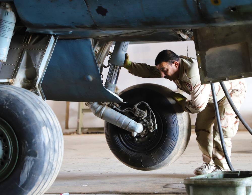 Iraq Air Force Conduct Maintenance on SU-25 Jets