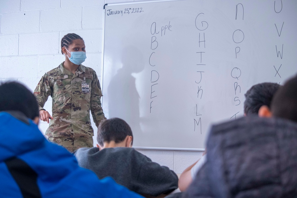 Afghan children participate in community-based education