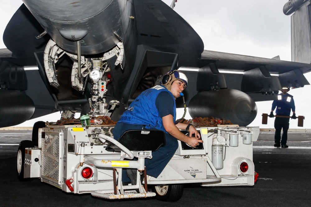 Abraham Lincoln Sailors move aircraft