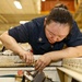 Abraham Lincoln Sailors conduct aircraft maintenance