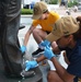 PCU Fort Lauderdale Sailors Clean Lone Sailor Statue