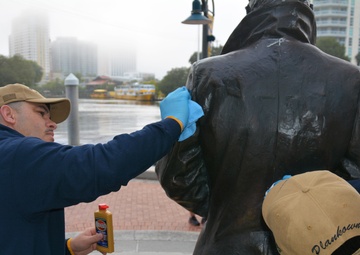 PCU Fort Lauderdale Sailors Clean Lone Sailor Statue