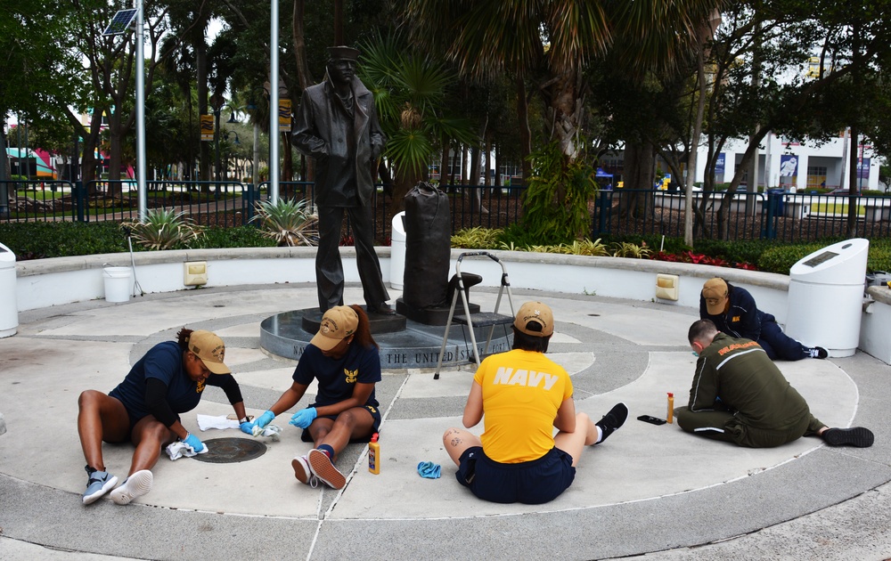 PCU Fort Lauderdale Sailors Clean Lone Sailor Statue