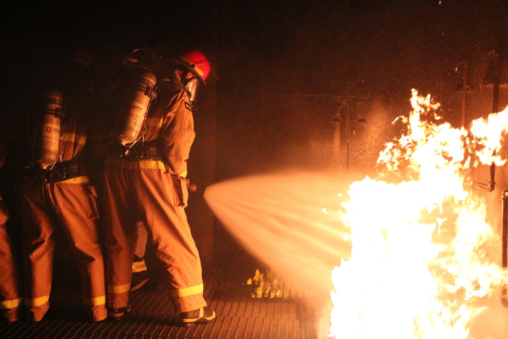 220126-N-N0485-0267 NEWPORT, R.I. (Jan. 26, 2022) OCS firefighting training