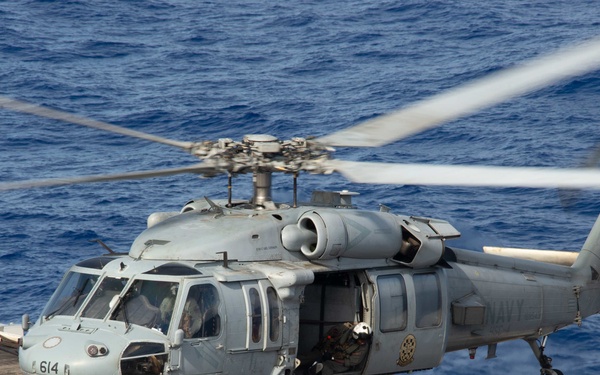 USS Carl Vinson (CN 70) Conducts a Replenishment-at-Sea in the Pacific Ocean