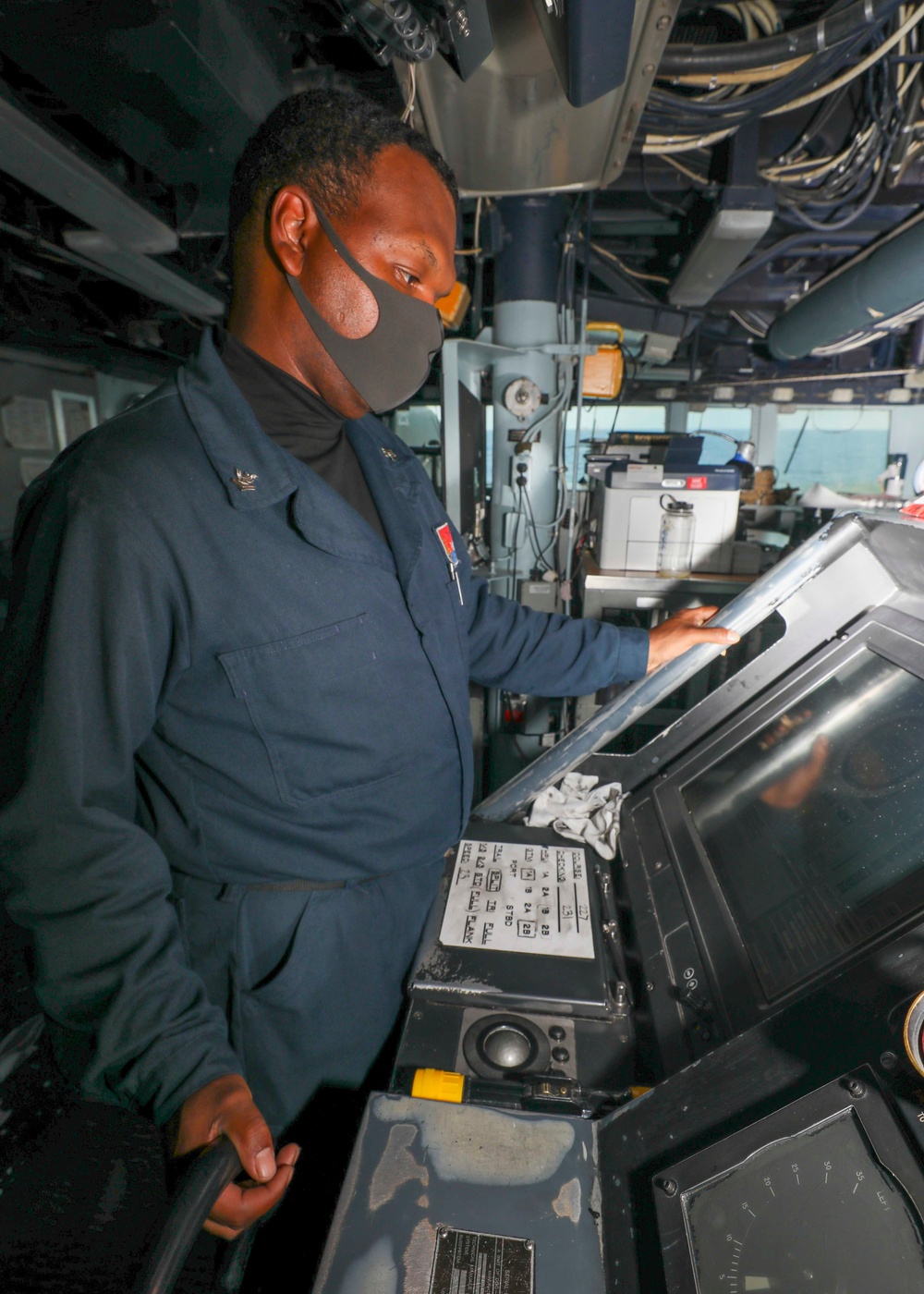 Logistics Specialist Mans the Helm