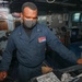 Logistics Specialist Mans the Helm