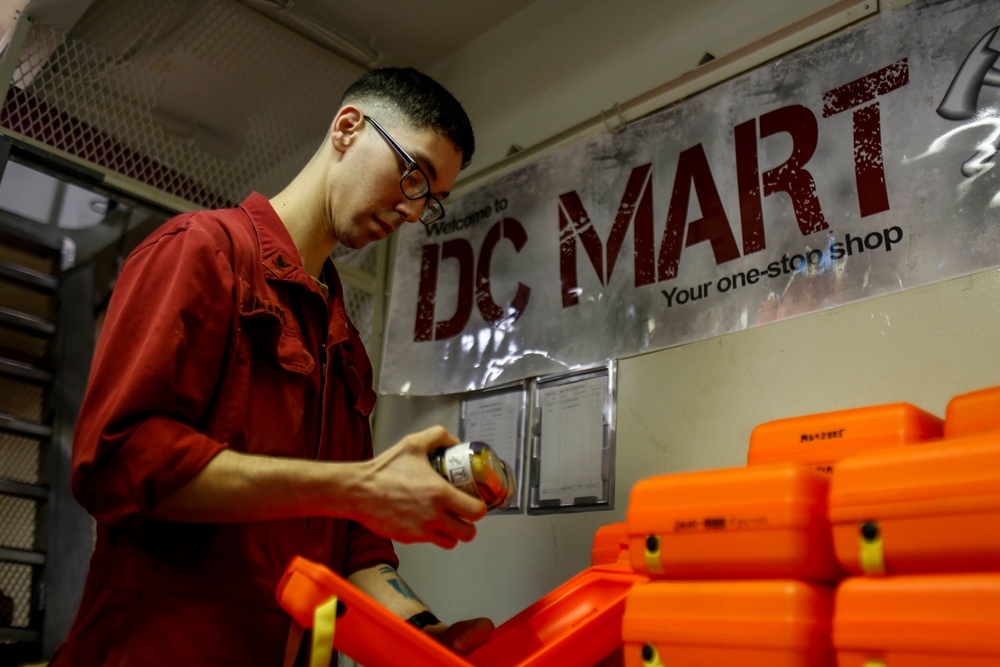 Abraham Lincoln Sailors inspect damage control equipment