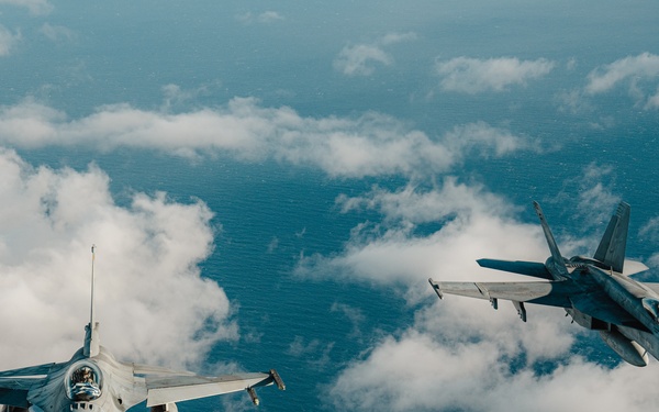 – United States F/A-18 Super Hornets and Greek F-16 Fighting Falcons conduct air-to-air training over the Ionian Sea as a part of Neptune Strike 2022