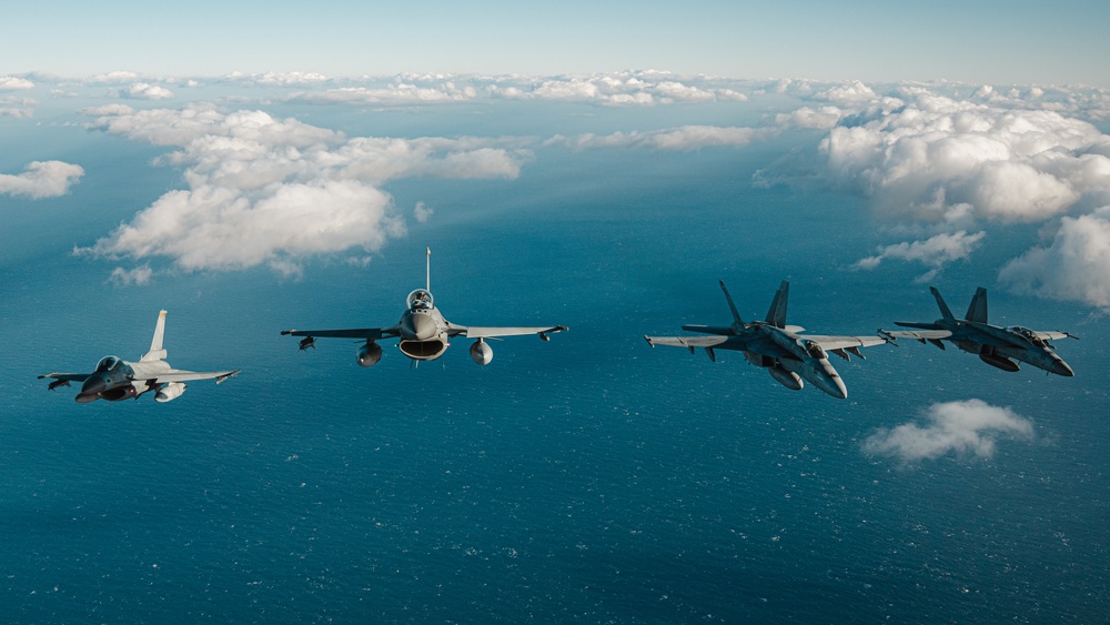 – United States F/A-18 Super Hornets and Greek F-16 Fighting Falcons conduct air-to-air training over the Ionian Sea as a part of Neptune Strike 2022