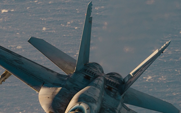 United States F/A-18 Super Hornets and Greek F-16 Fighting Falcons conduct air-to-air training over the Ionian Sea as a part of Neptune Strike 2022