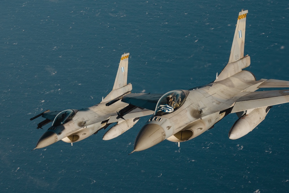 United States F/A-18 Super Hornets and Greek F-16 Fighting Falcons conduct air-to-air training over the Ionian Sea as a part of Neptune Strike 2022