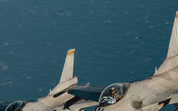 United States F/A-18 Super Hornets and Greek F-16 Fighting Falcons conduct air-to-air training over the Ionian Sea as a part of Neptune Strike 2022