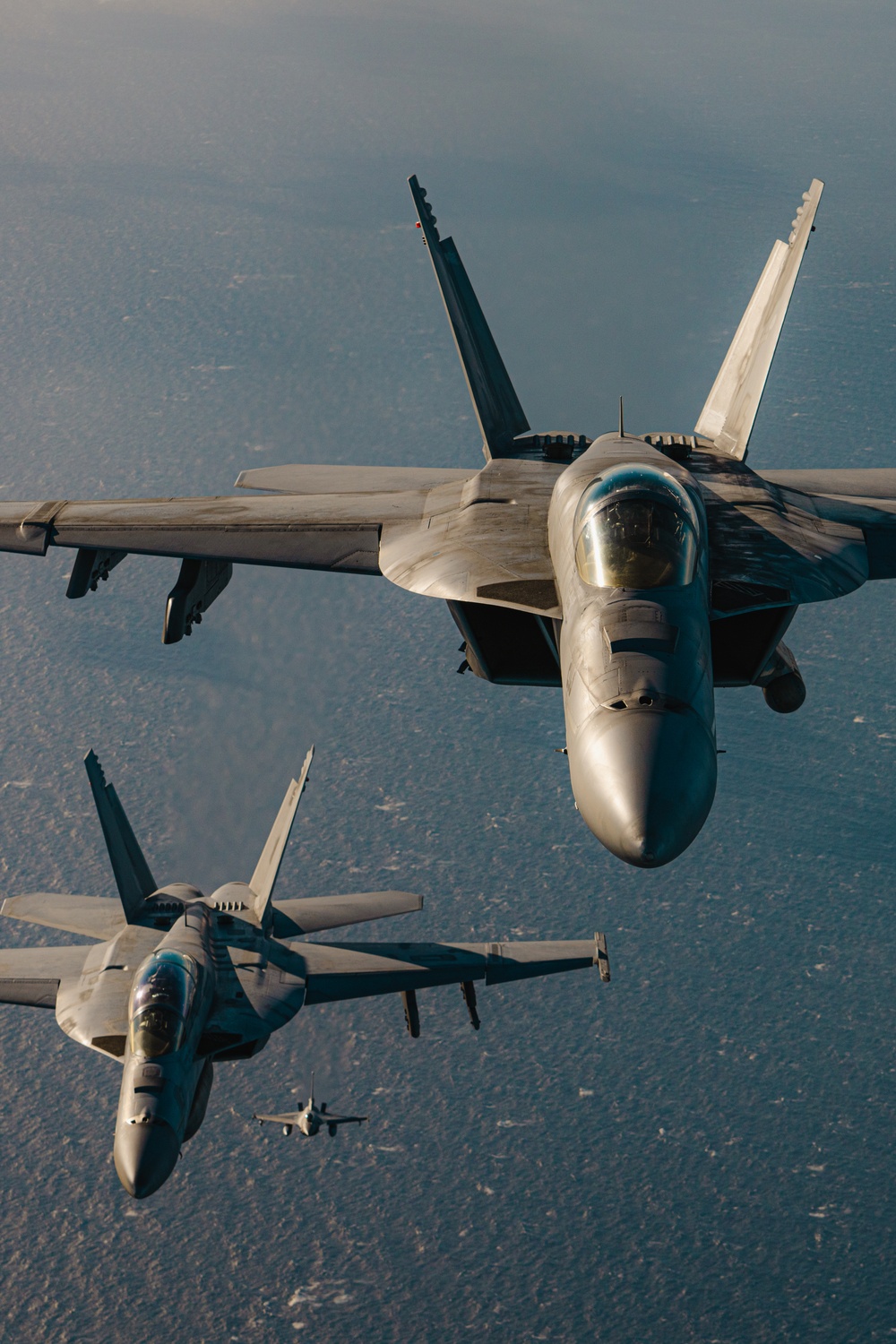 United States F/A-18 Super Hornets and Greek F-16 Fighting Falcons conduct air-to-air training over the Ionian Sea as a part of Neptune Strike 2022