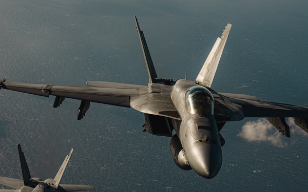 United States F/A-18 Super Hornets and Greek F-16 Fighting Falcons conduct air-to-air training over the Ionian Sea as a part of Neptune Strike 2022