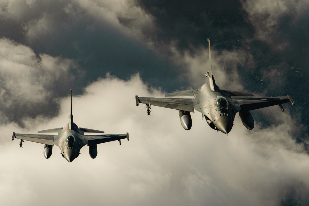 United States F/A-18 Super Hornets and Greek F-16 Fighting Falcons conduct air-to-air training over the Ionian Sea as a part of Neptune Strike 2022