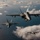 United States F/A-18 Super Hornets and Greek F-16 Fighting Falcons conduct air-to-air training over the Ionian Sea as a part of Neptune Strike 2022
