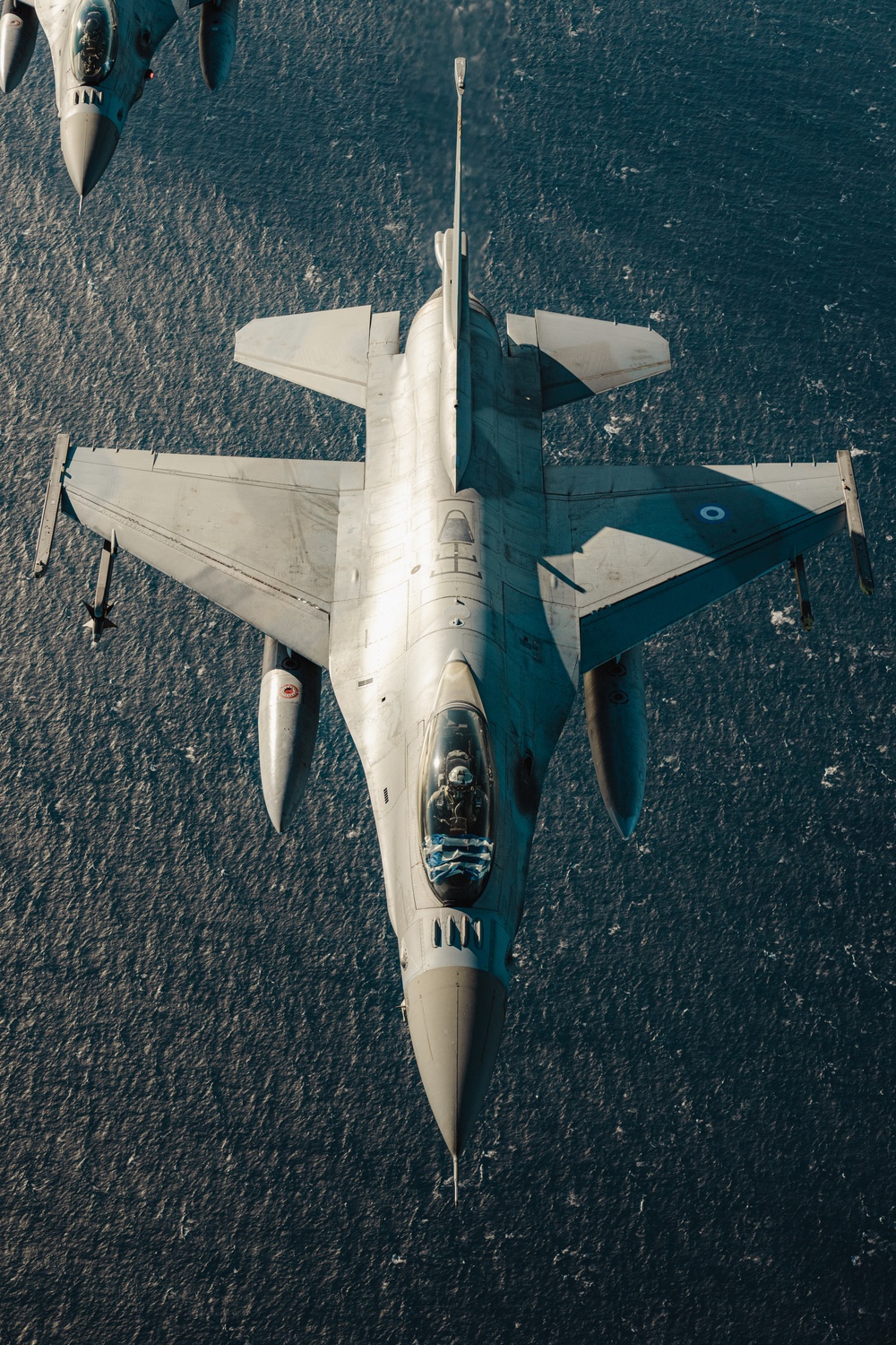 – United States F/A-18 Super Hornets and Greek F-16 Fighting Falcons conduct air-to-air training over the Ionian Sea as a part of Neptune Strike 2022