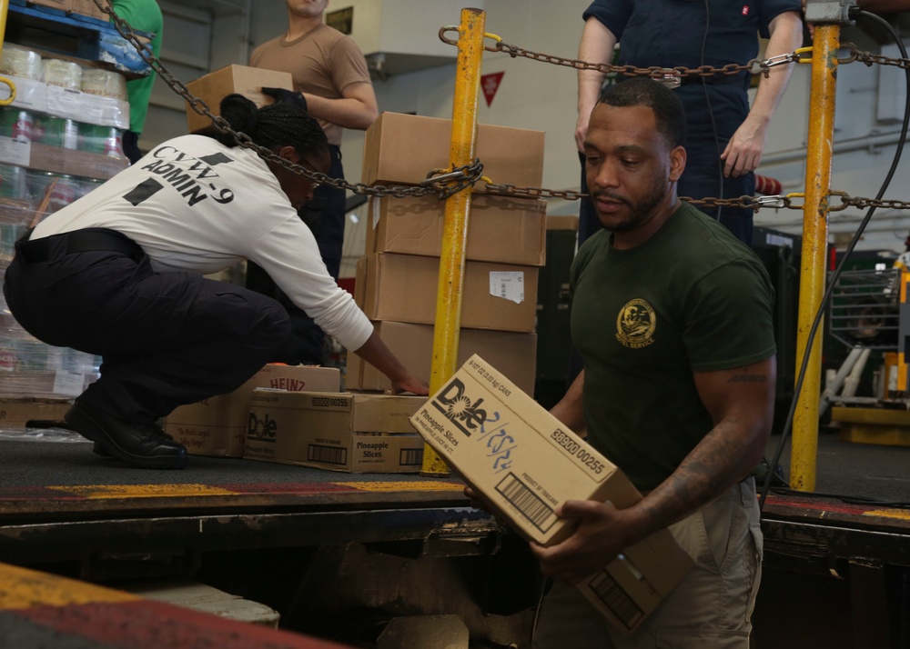 Abraham Lincoln Sailors transport cargo