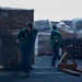 Abraham Lincoln Sailors transport cargo