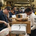 Abraham Lincoln Sailors process cargo
