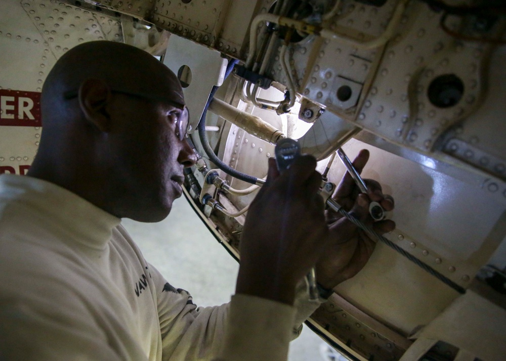 Abraham Lincoln Sailors conduct aircraft maintenance