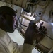 Abraham Lincoln Sailors conduct aircraft maintenance