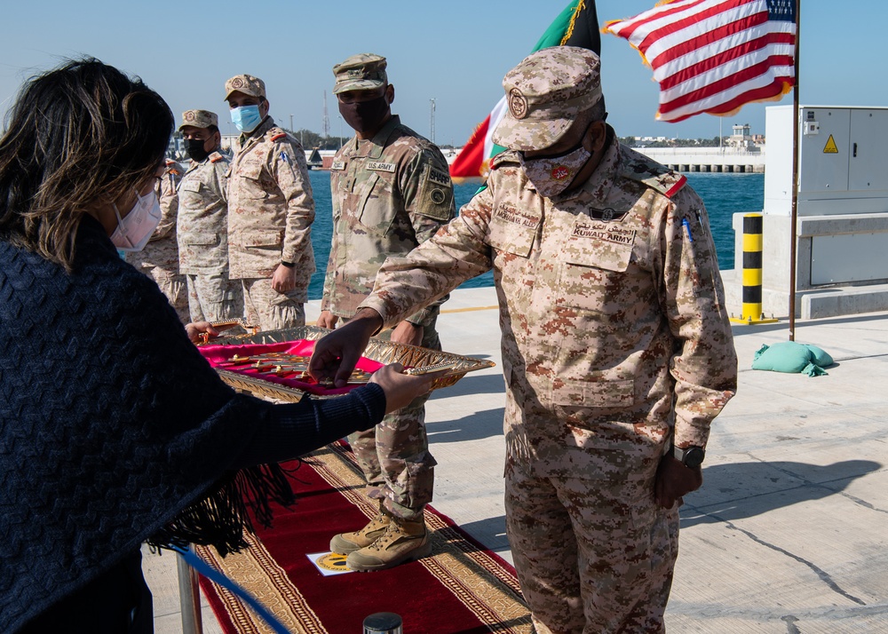 USACE commanding general and officials cut the ceremonial ribbon to open Kuwaiti Navy pier