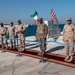 USACE commanding general and officials cut the ceremonial ribbon to open Kuwaiti Navy pier