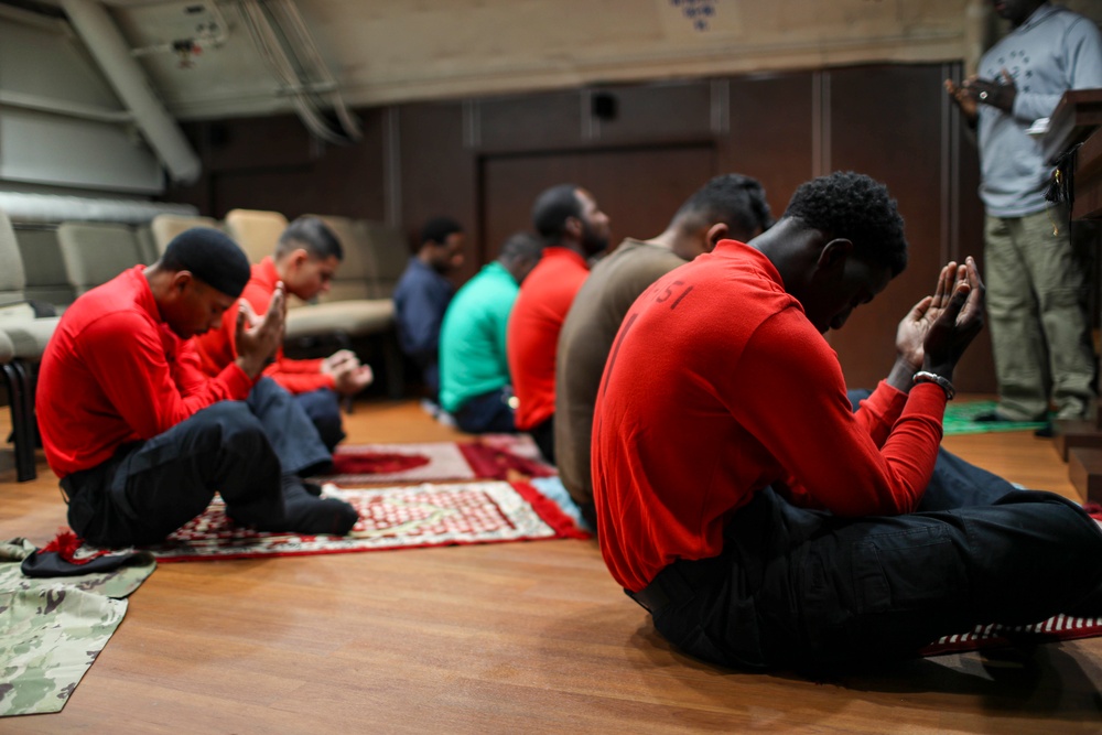 Abraham Lincoln Sailors practice Muslim prayer