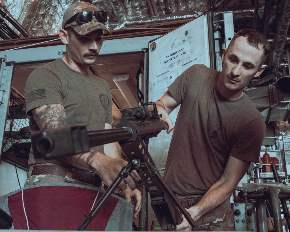 Coast Guardsmen Aboard USS Billings Cleans Weapons