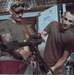 Coast Guardsmen Aboard USS Billings Cleans Weapons