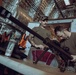 Coast Guardsmen Aboard USS Billings Cleans Weapons